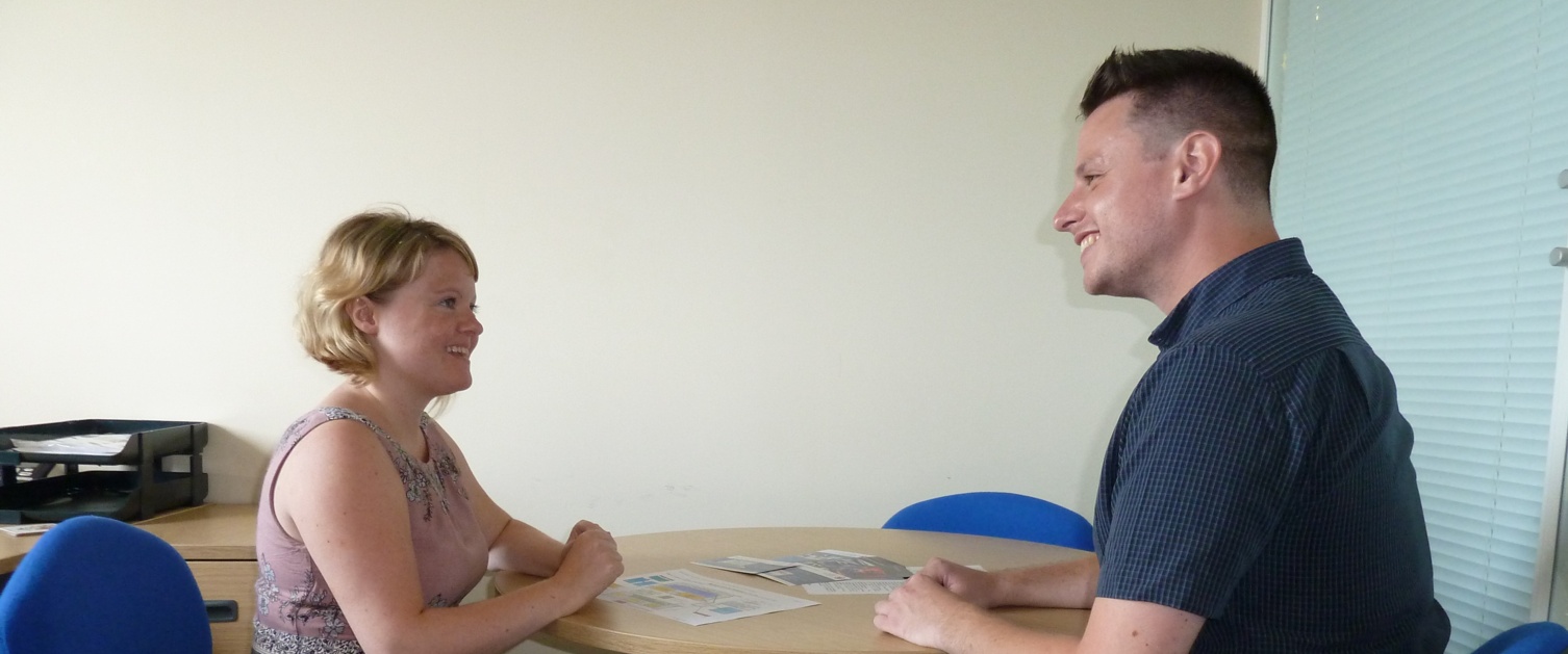 Doctor talking with a patient