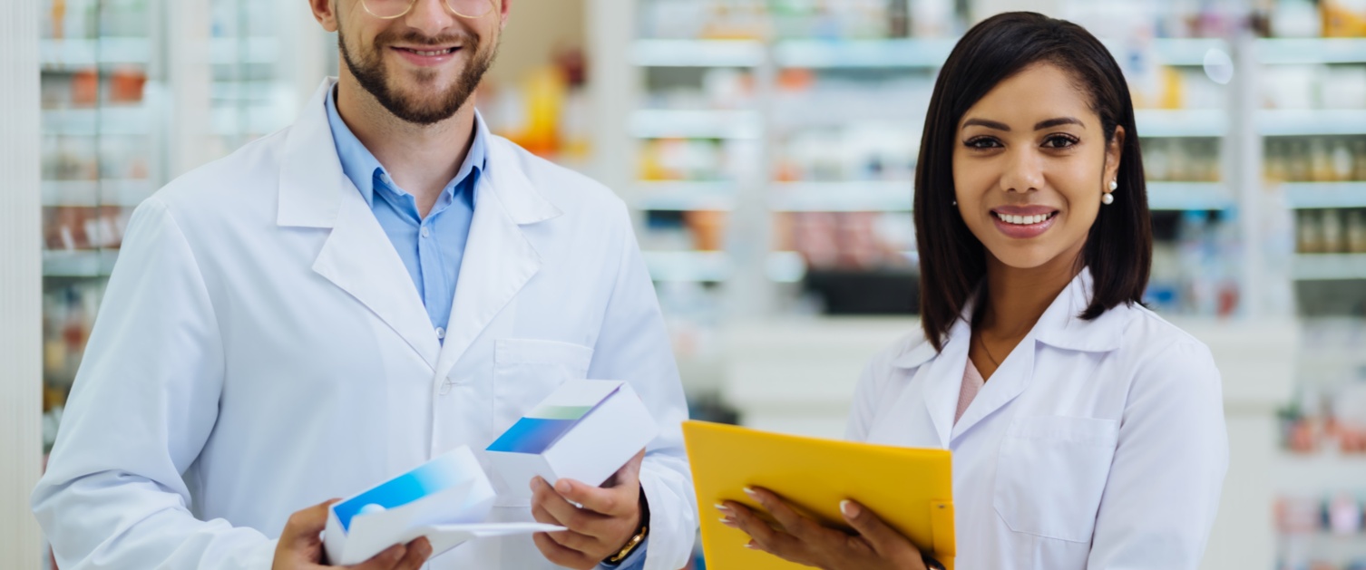 Two pharmacists smiling