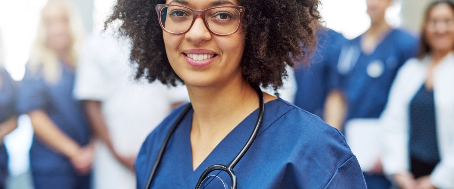 Young doctor smiling