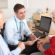 Doctor consulting elderly