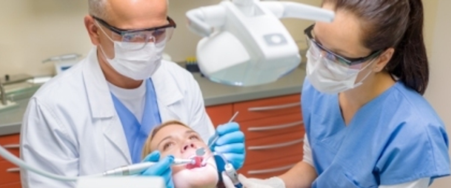 Dentists with patient