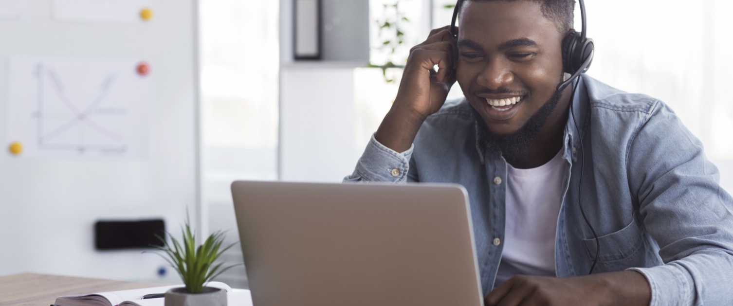 Trainee working at a laptop