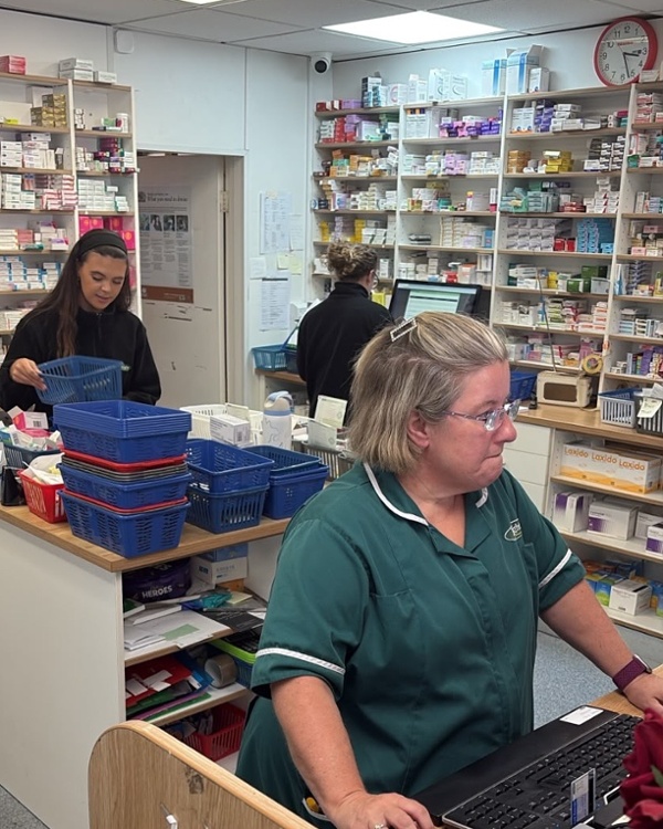Pharmacy staff using EPS