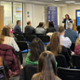 Group of participants sitting at a presentation of the 