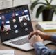 Person viewing a Microsoft Teams meeting on a laptop computer