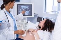 Woman in hospital receiving ultrasound scan