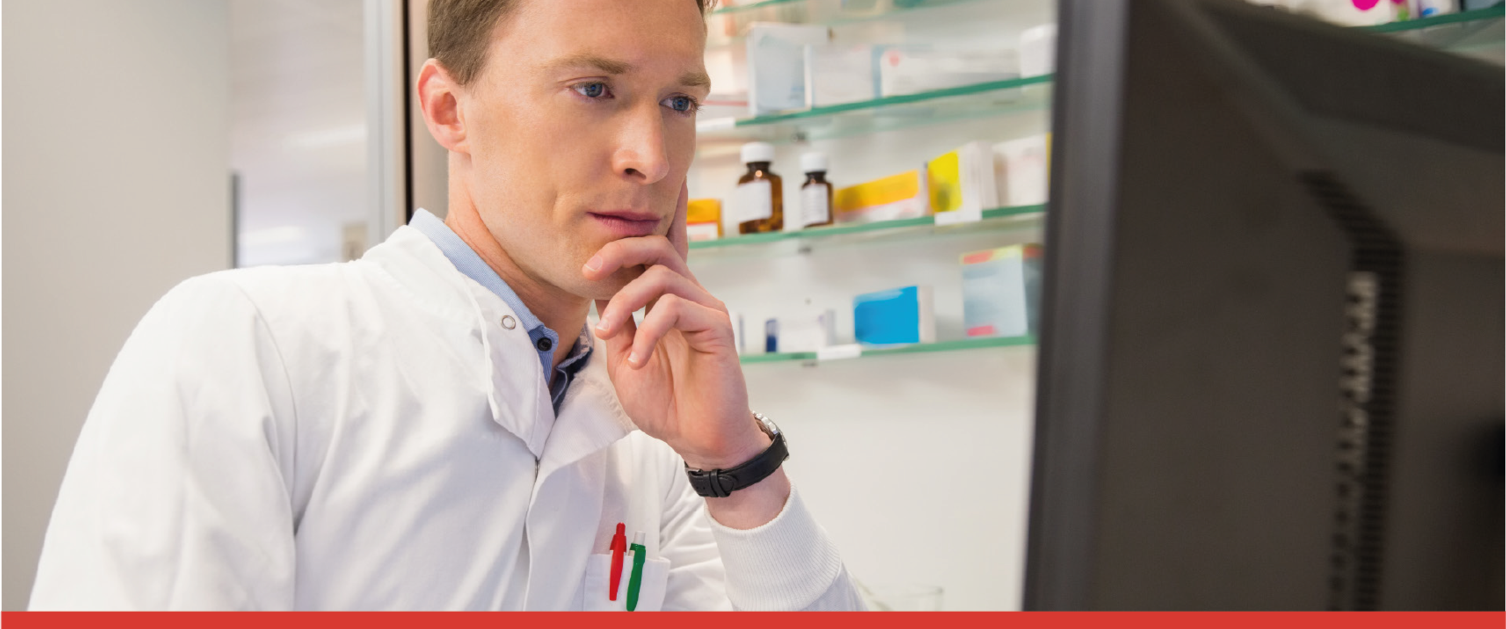 man looking at application for Inclusion in the pharmaceutical lList