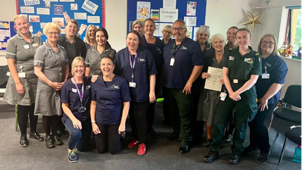 Group photo of Community Midwives of PROMPT Wales and Paramedics on training day