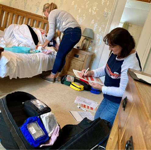Image of Community Midwives at the patients home doing routine check-up