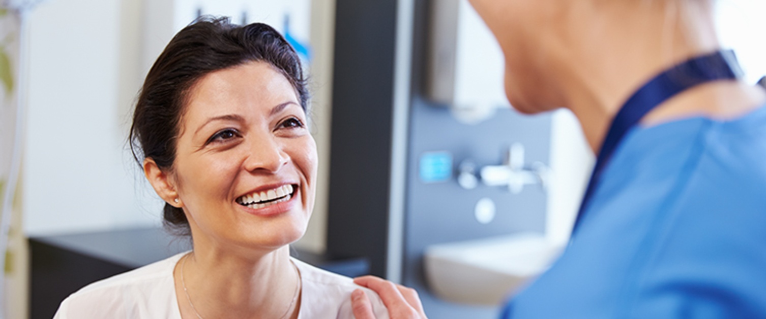 Happy patient with a nurse