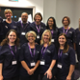 Image on group of midwives in purple uniform, representing PROMPT Wales for implementation