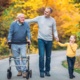 Picture of child, father and grandfather. Grandfather has a walking aid.