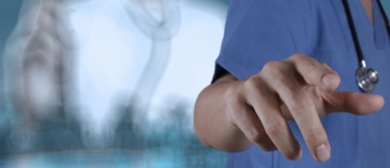 Image of male arm in scrub uniform, with blurred background