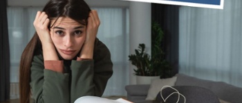 Text Reads: Worried about returning to Uni? Image of girl with hands on head and open book on table.