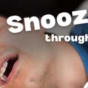 Text Reads: Snooze through Winter. Close up image of man sleeping with head on pillow