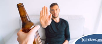 Image of male refusing alcohol