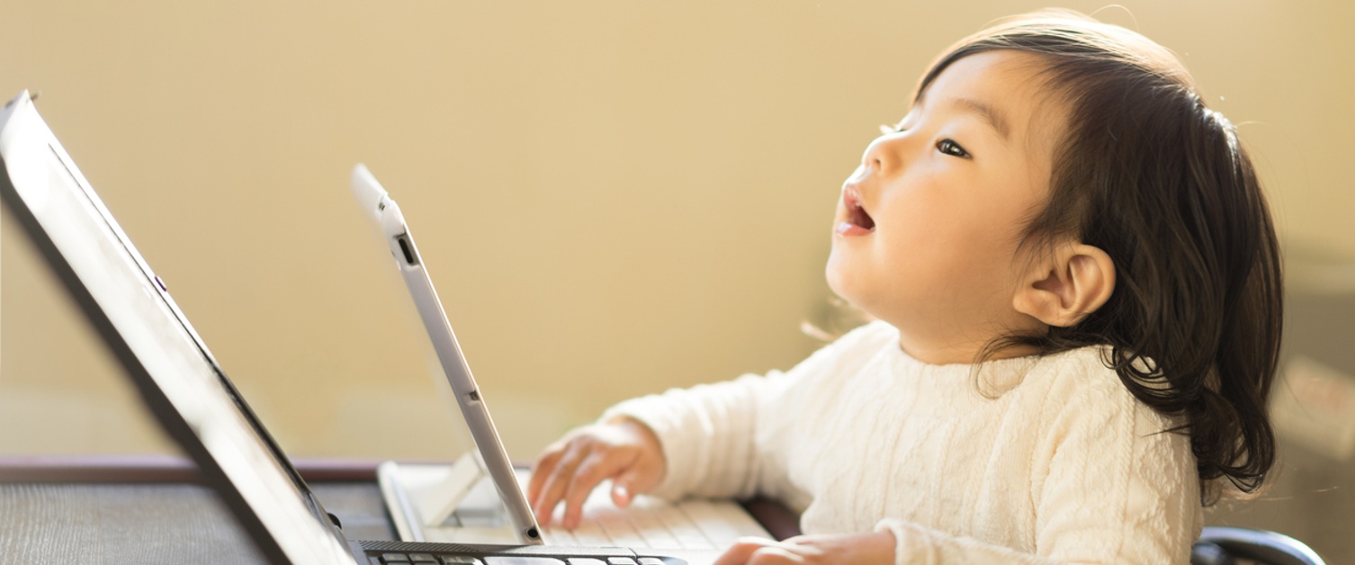 little girl on laptop