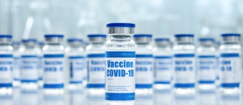 Row of Coronavirus vaccine flasks