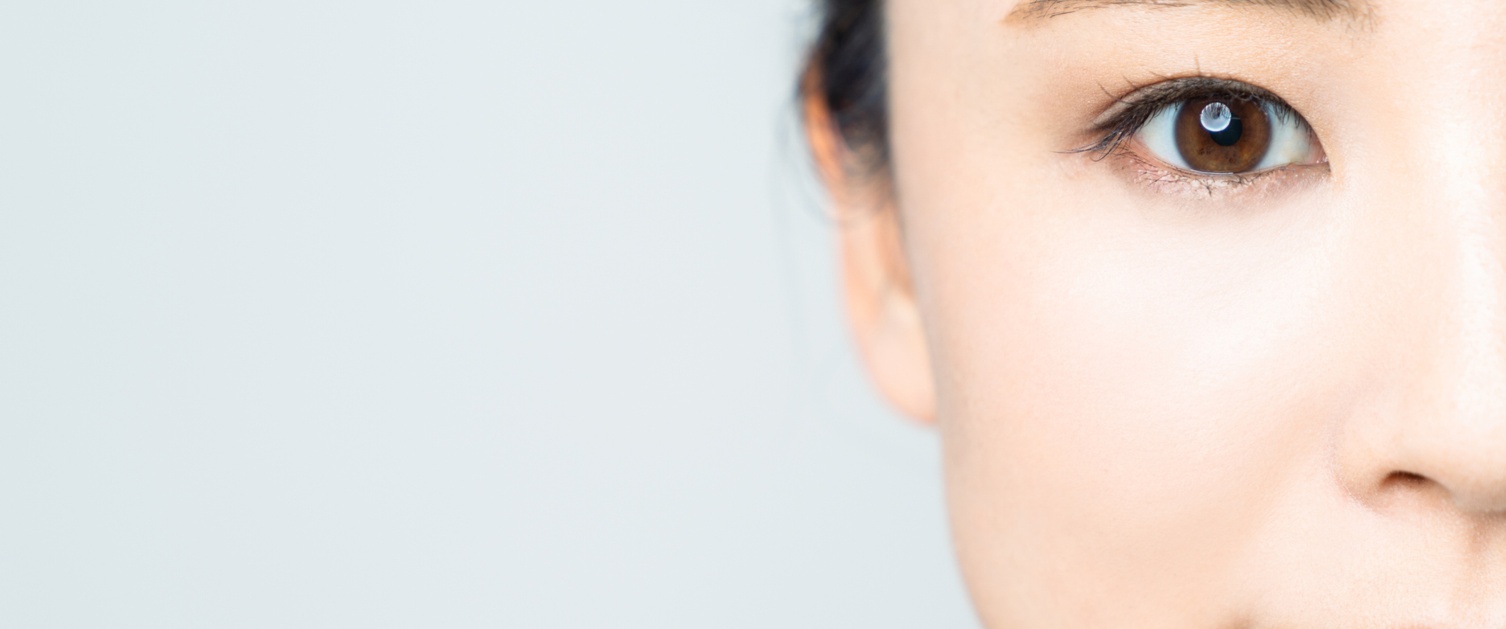 Close up of half of a womans face