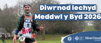 Testun yn Darllen: Diwrnod Iechyd Meddwl y byd 2026. Delwedd o Wayne mewn sefyllfa rhedeg.