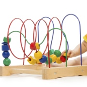 Baby playing with developing toys.jpg