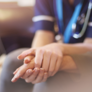 Nurse consoling patient