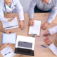 A group of professionals working around a table