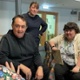A group of people listening during a conversation.