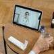 A patient and doctor during a virtual consultation.