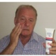 Man applying skin cream