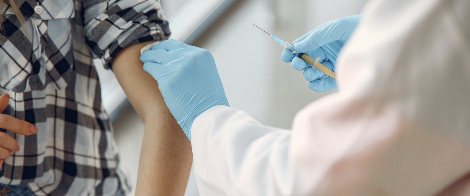 A person receives a vaccination.