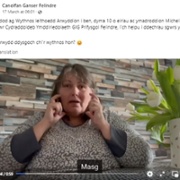 A Welsh language tweet from Velindre University Trust and a video of a woman talking to camera.