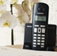 A black landline telephone.