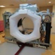 A white ring-shaped machine.