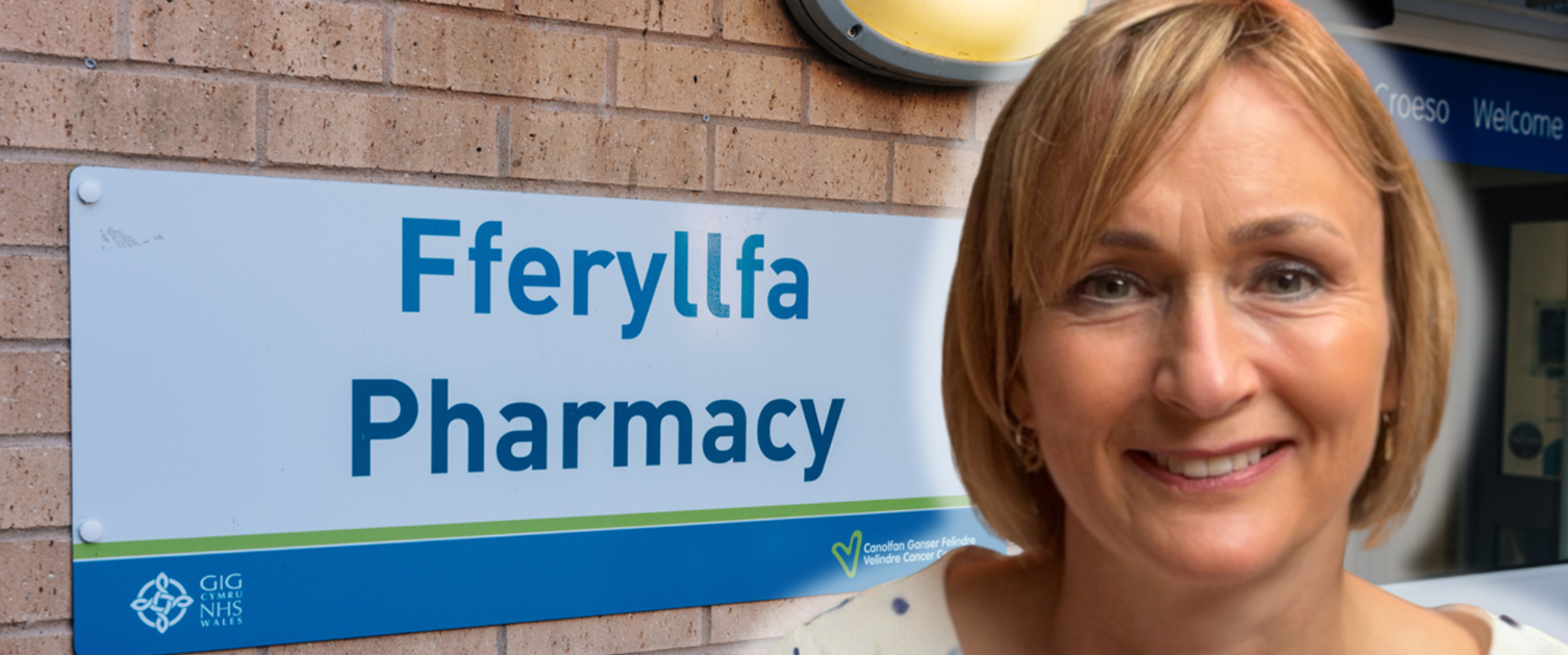 A photo of Chief Pharmacist Bethan Tranter smiling in front of a 
