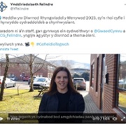 A Welsh language tweet from Velindre University Trust and a video of a woman talking to camera.