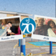 Two family polaroid photos placed in front of Velindre Cancer Centre.