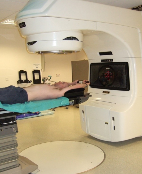 Radiotherapy treatment using wing board