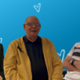 Three patients smile as they receive treatment from Velindre Cancer Service.